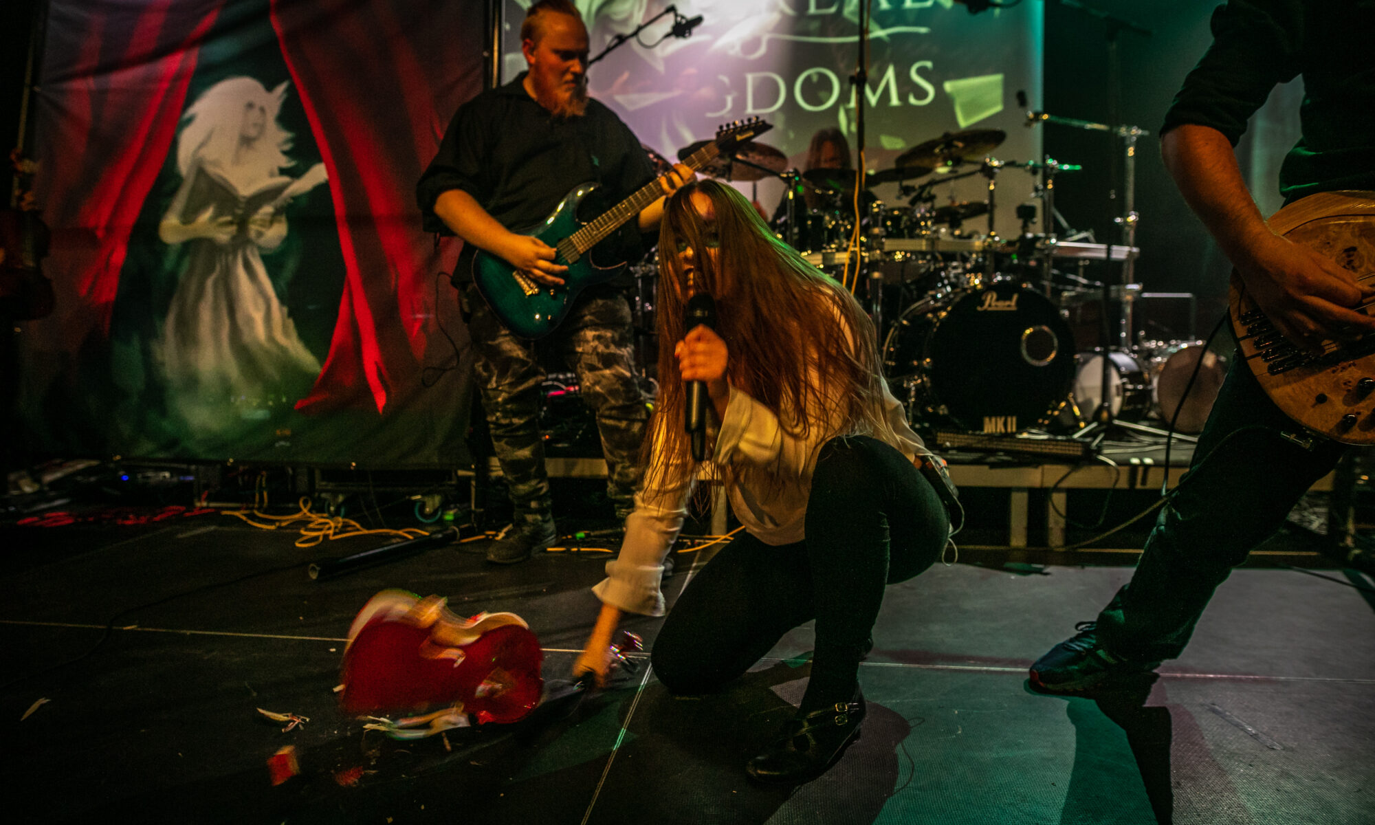Ethereal Kingdoms live with finntroll. Sofia Schmidt destroying a violin on stage.