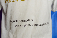 Backside detail with quote "I search for beauty for within me there is none"